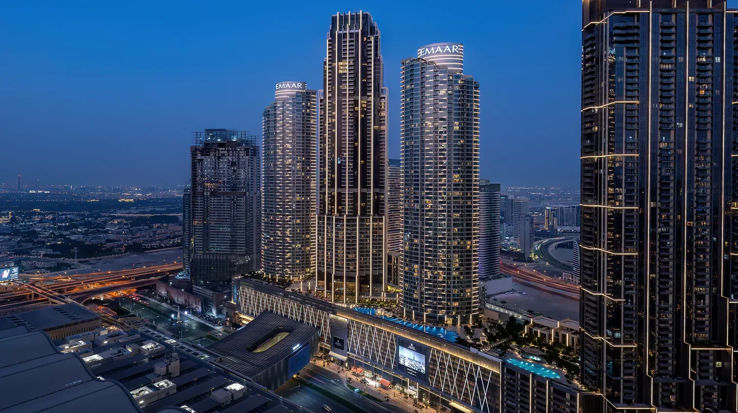 Address Dubai Mall hotel at night with city lights, Dubai