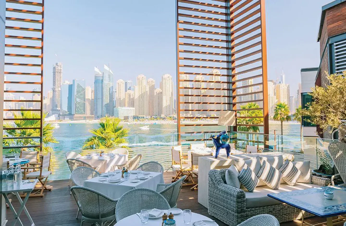 Alici Dubai restaurant's elegant waterfront dining with stunning city skyline views