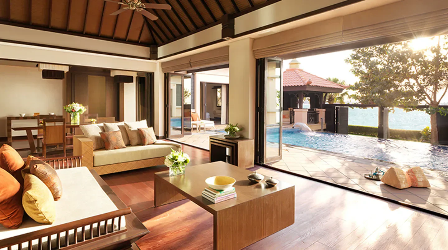Luxury living space at Anantara The Palm Dubai Resort, with pool view in Dubai.