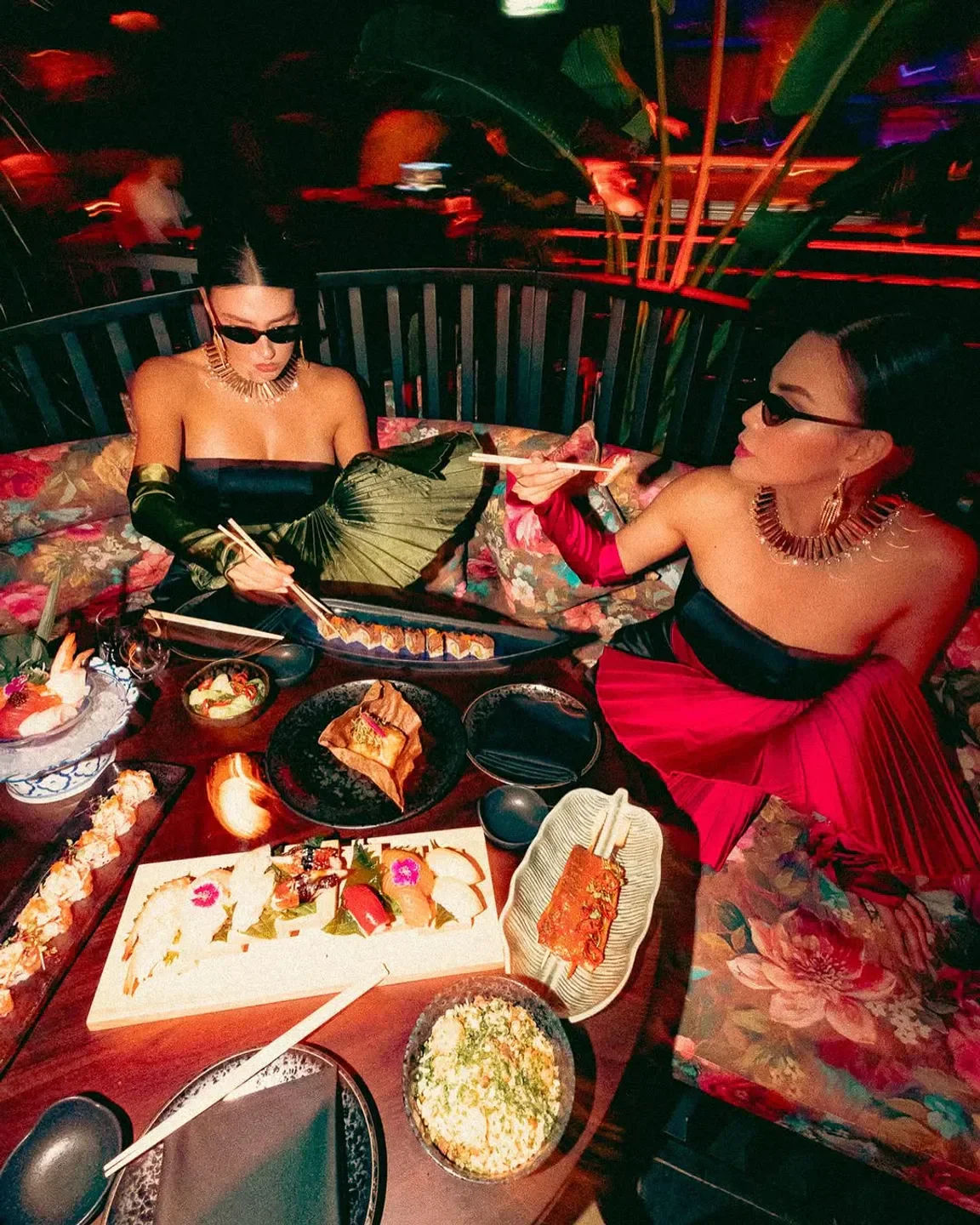 Stylish dining at Asia Asia Palm Jumeirah in Dubai with sushi and glamorous guests