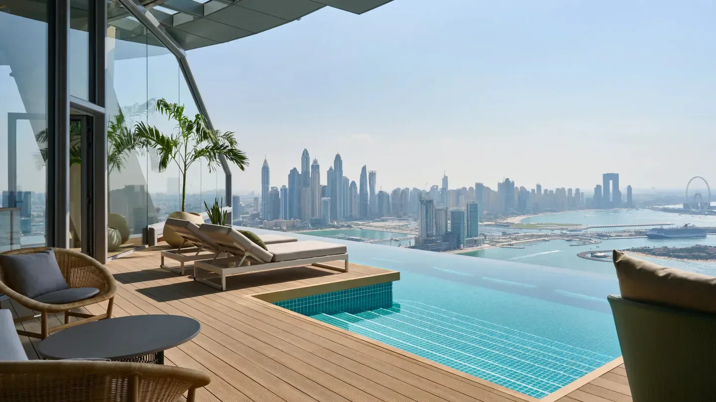 Aura Beach Club in Dubai with stunning infinity pool and city skyline views.