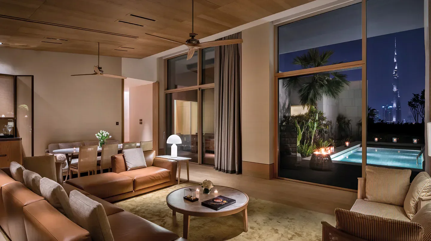 Luxury living room at Bvlgari Resort and Residences Dubai, overlooking the city skyline.