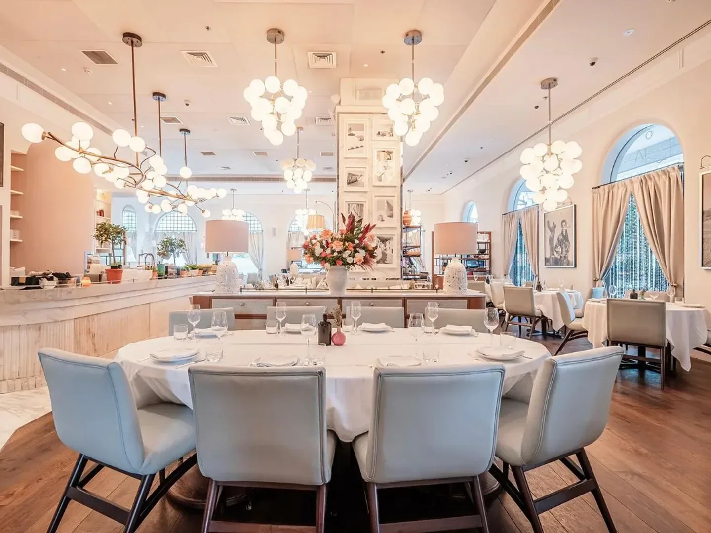 Elegant dining area inside Gaia restaurant in Dubai, featuring stylish lighting and decor