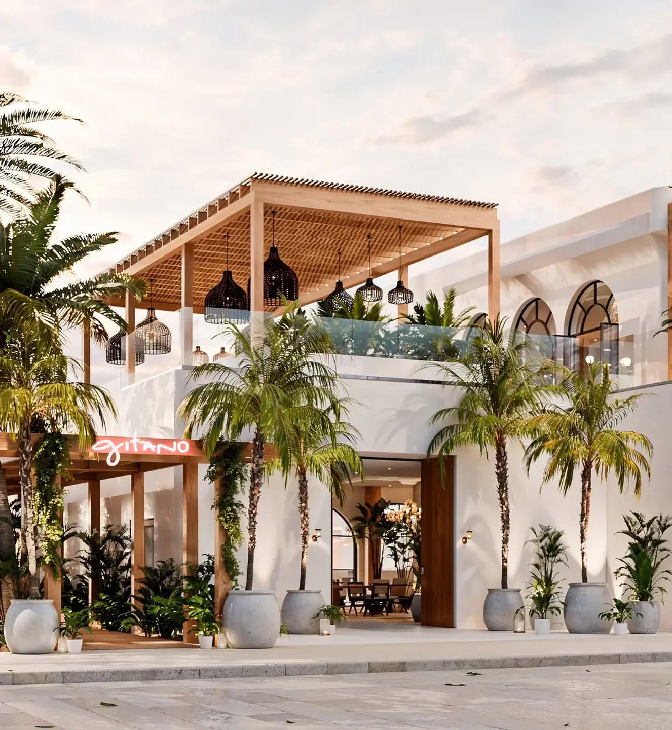 Gitano Dubai beach club exterior with tropical plants and stylish architecture.