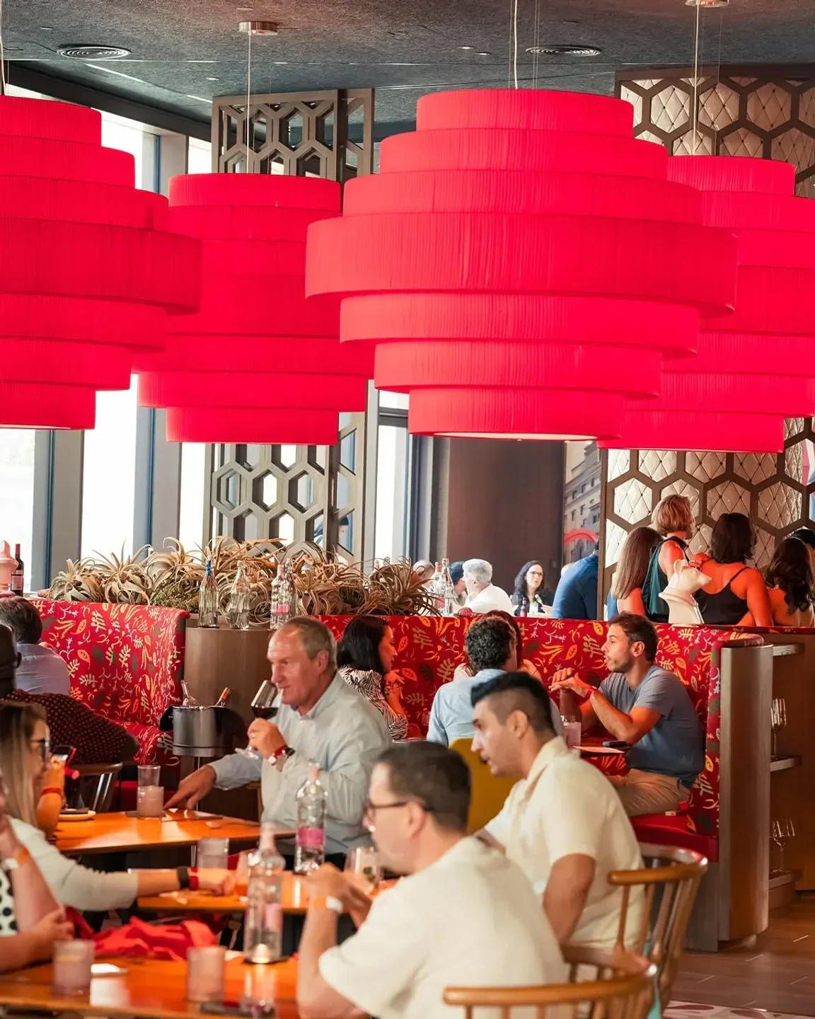 Dining scene at Jaleo Dubai By José Andrés, showcasing the restaurant's elegant interior in Dubai.