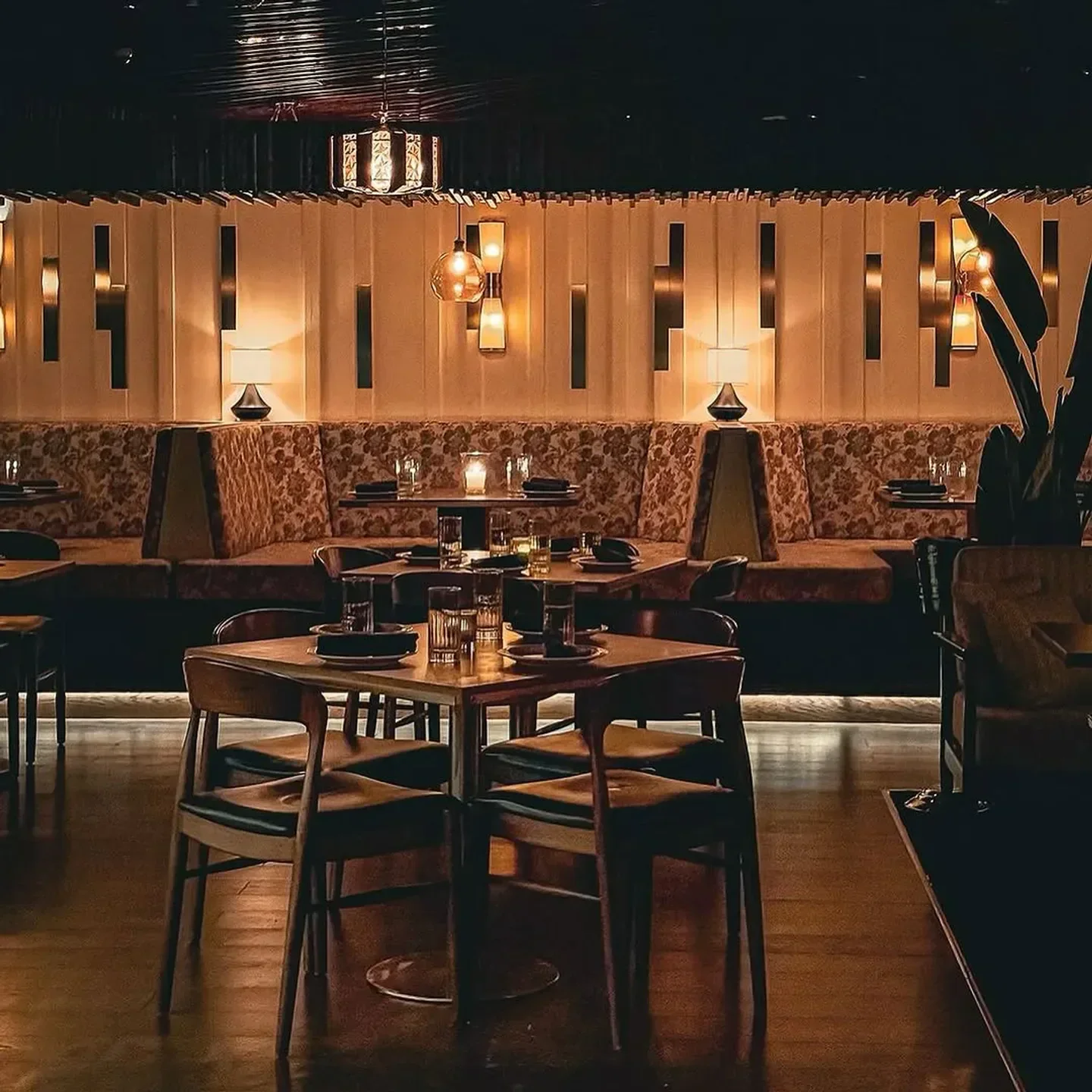 Cozy dining area at Mr Nice Guy in Dubai, featuring warm lighting and inviting decor.