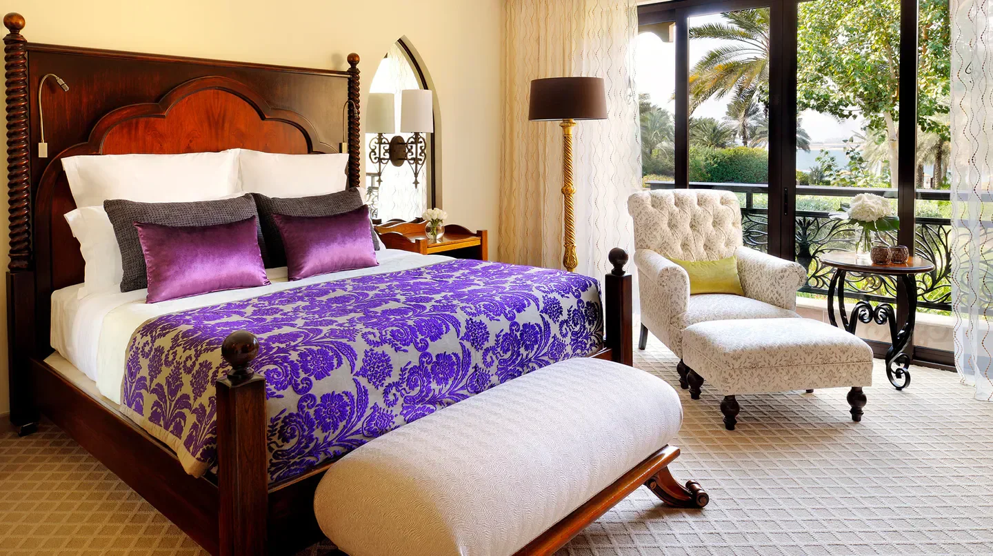 Bedroom interior at One&Only Royal Mirage - Arabian Court in Dubai, luxurious and inviting.
