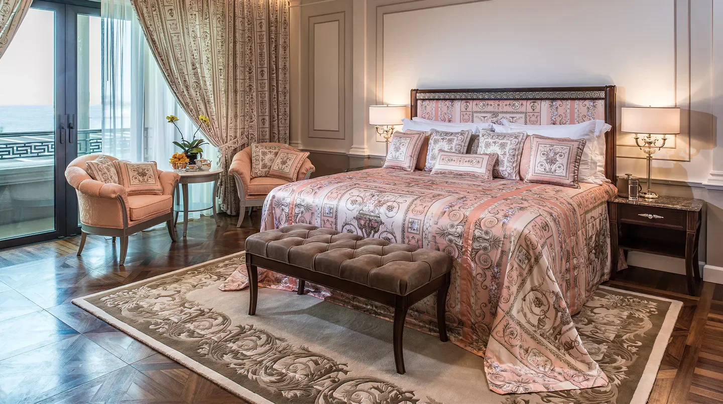 Luxury bedroom at Palazzo Versace Dubai, featuring elegant design and Dubai views.