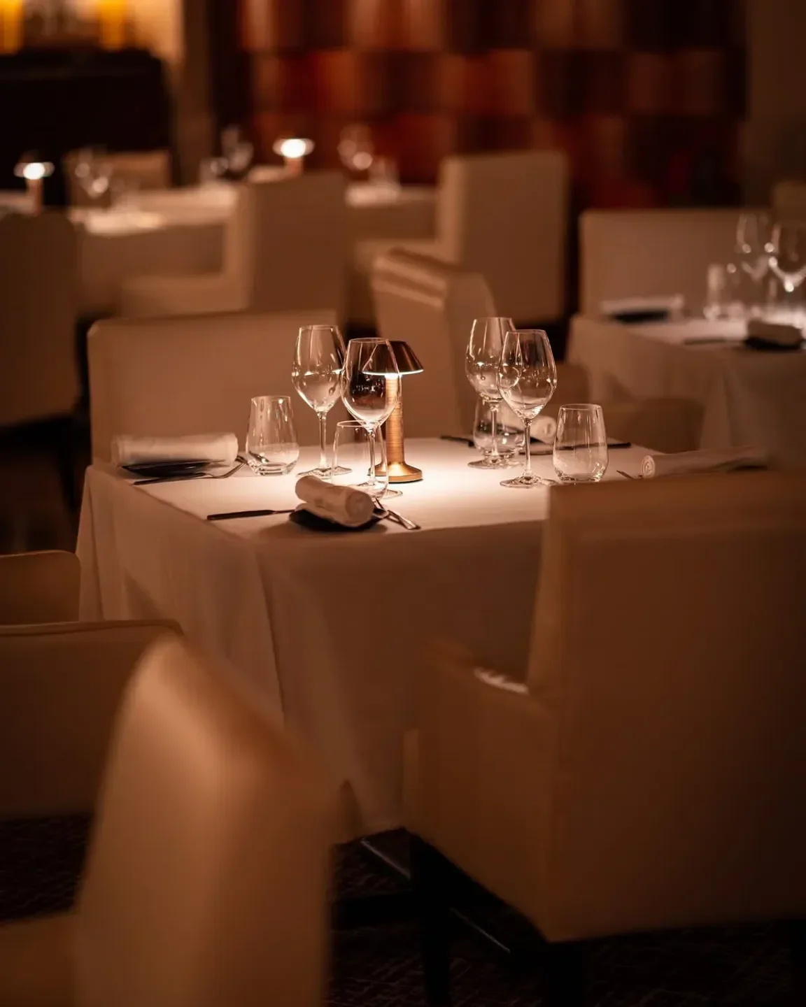 Elegant dining at Seafire Steakhouse & Bar in Dubai, showcasing table setting and ambiance