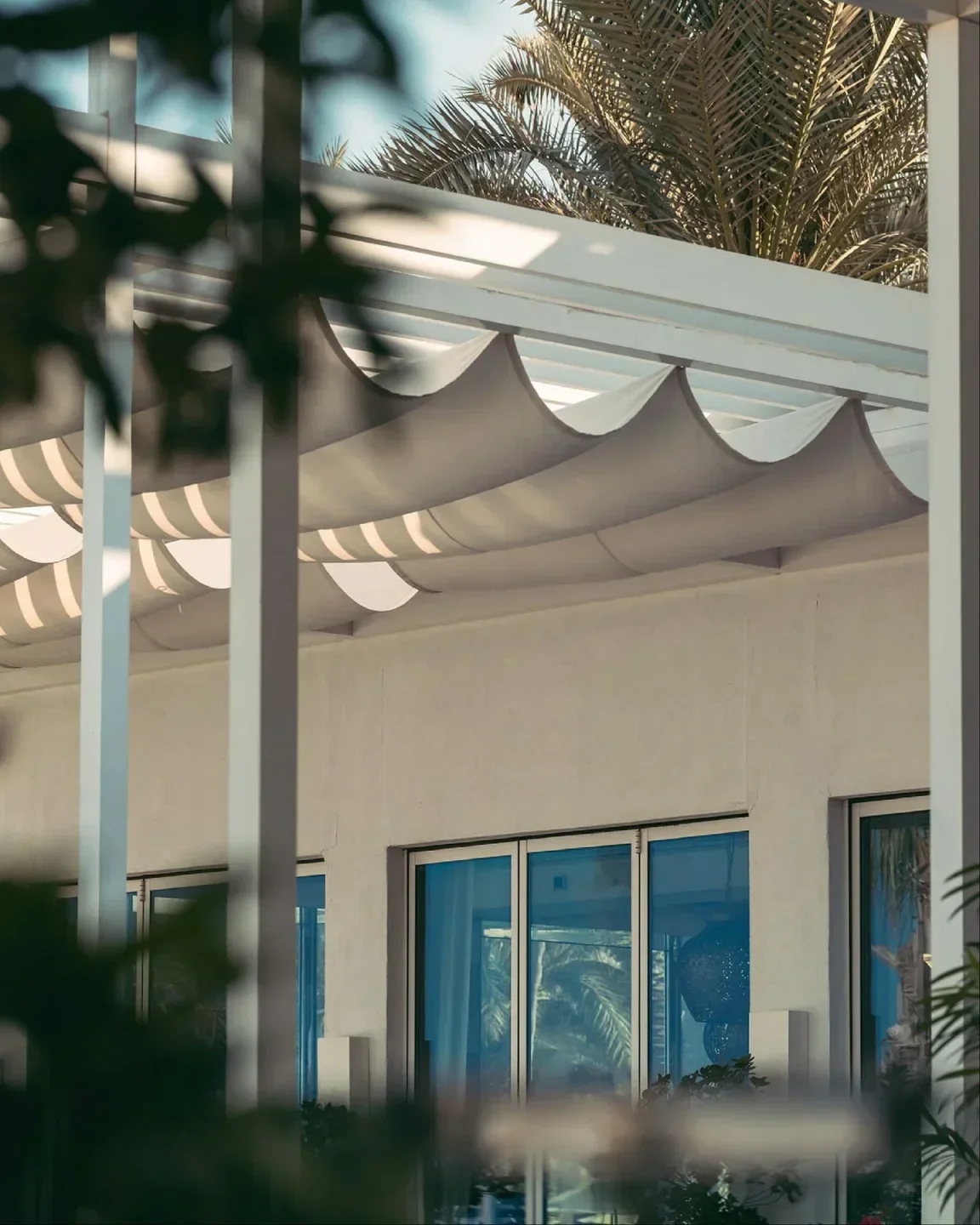 Shaded patio at The Beach Bar & Grill in Dubai, perfect for relaxing