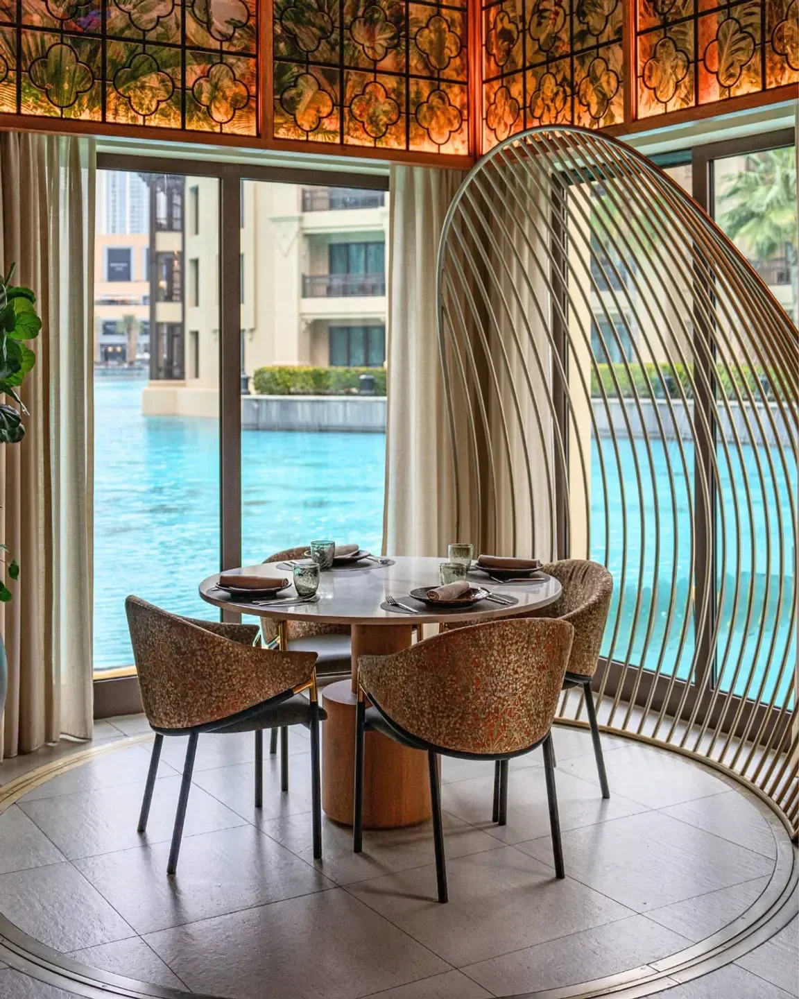 Elegant dining space at Thiptara restaurant in Dubai, overlooking the water