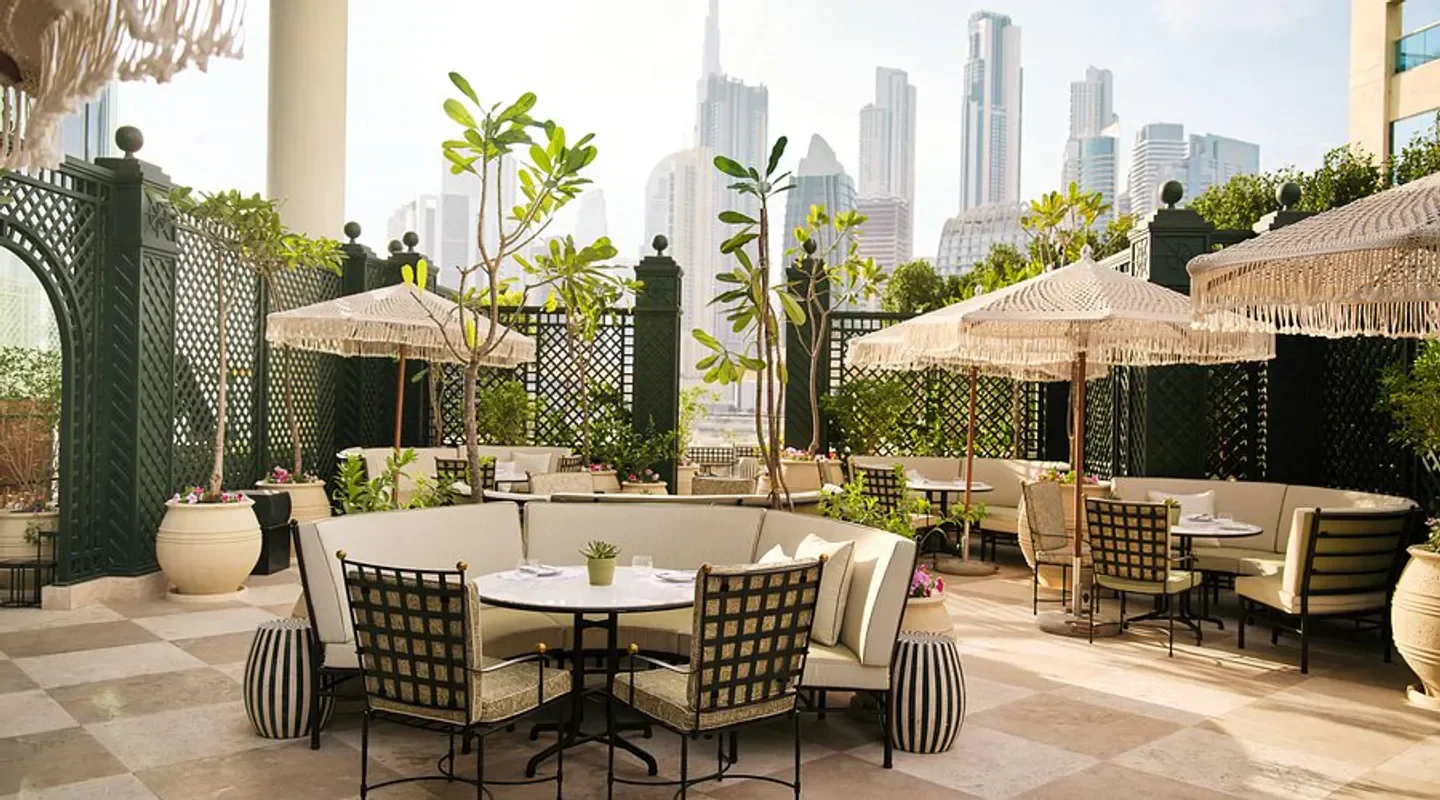 Veranda restaurant in Dubai with outdoor seating and city views, perfect for dining.